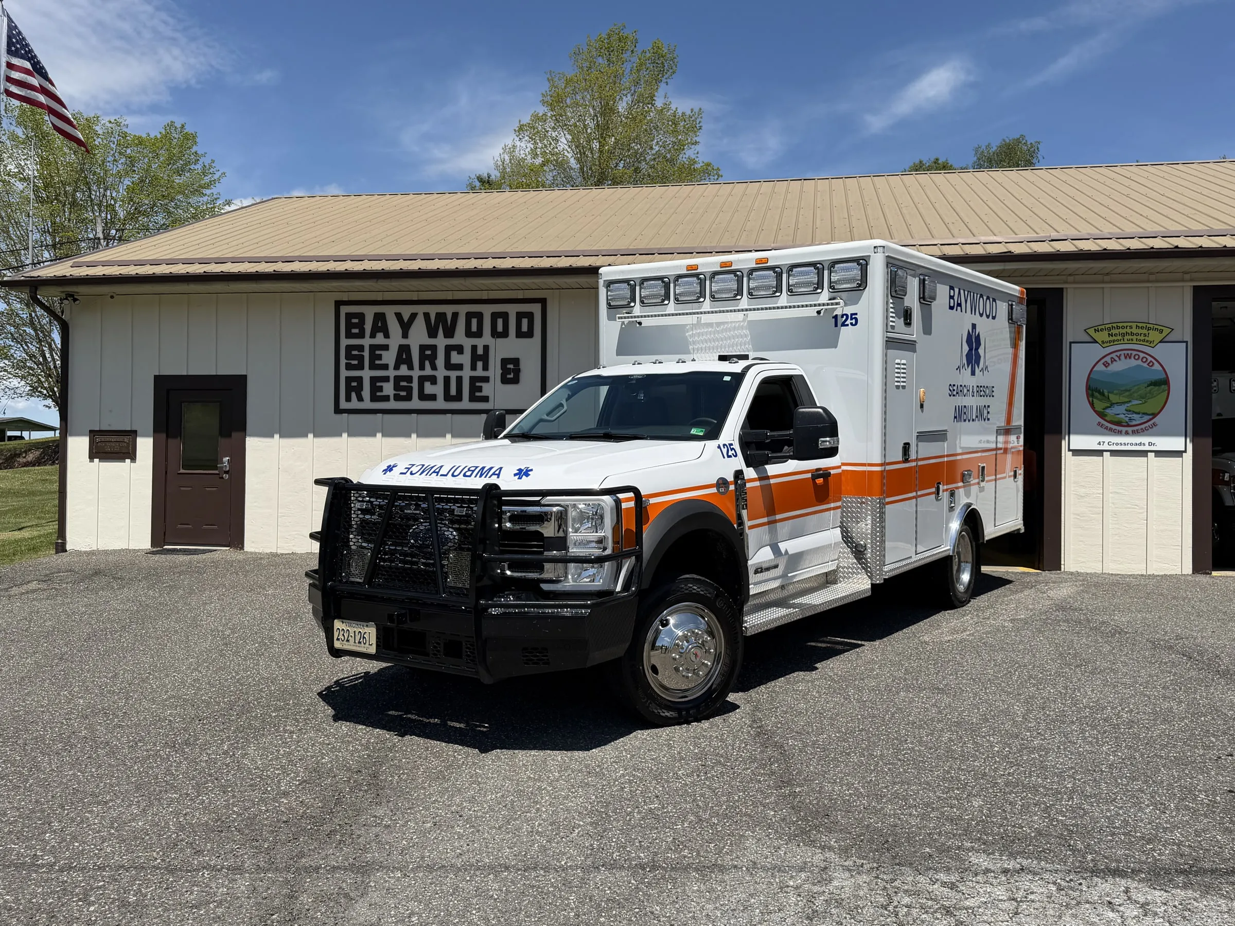 Baywood Search and Rescue Ambulance 125 parked in front of the station